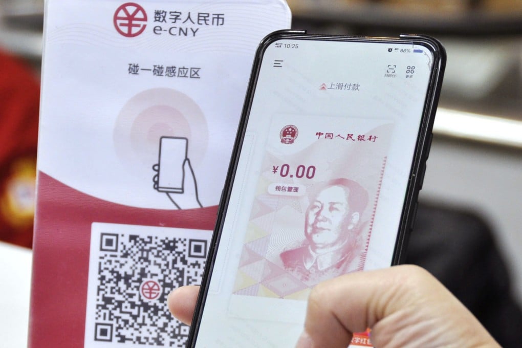 A Suzhou resident uses the e-CNY smartphone app during a trial on December 14, 2020. Photo: Kyodo