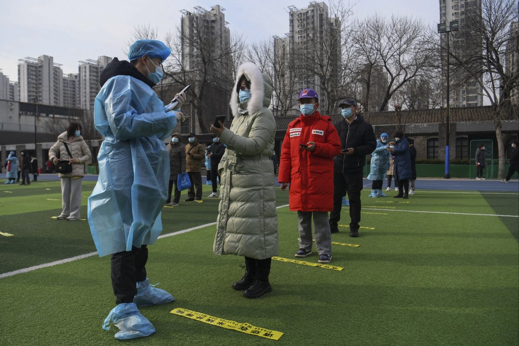 A woman registers for a Covid-19 test in Tianjin on Sunday, as the northern city began mass testing its 14 million residents. Photo: Xinhua