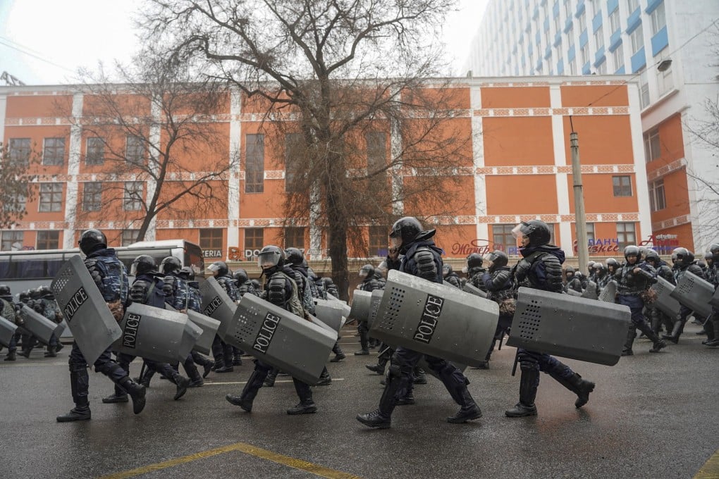 Kazakh policemen seen in Almaty during protests on January 5. Photo: EPA