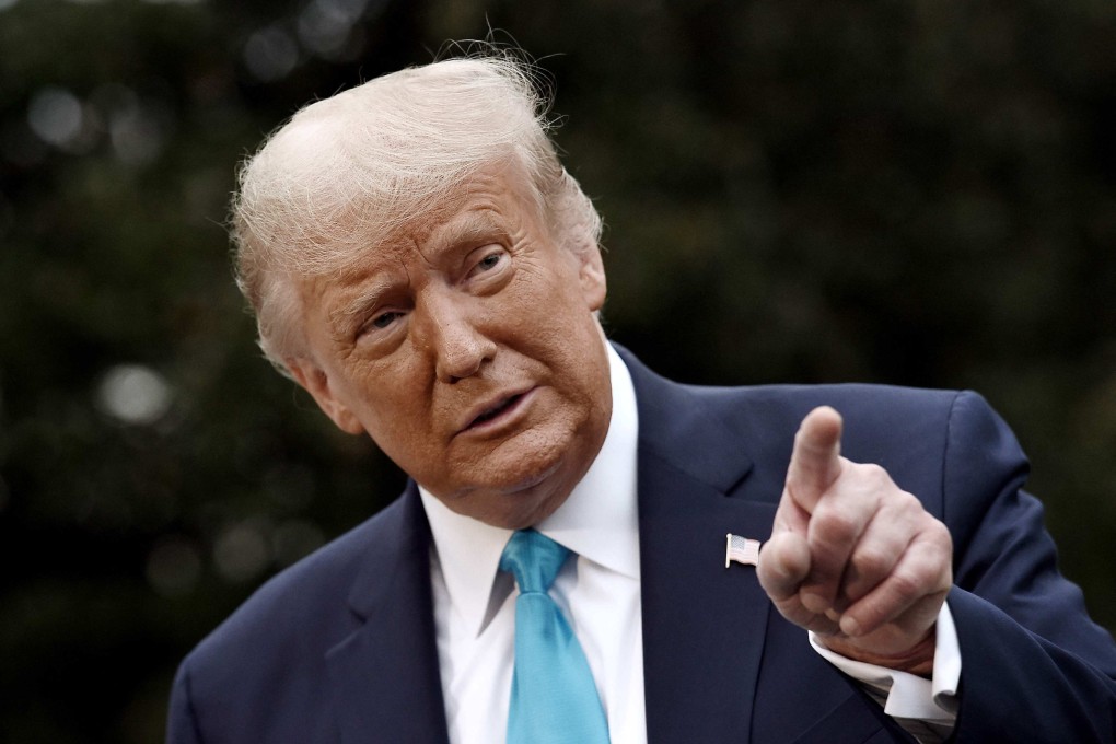 US president Donald Trump speaks to reporters as he makes his way to board Marine One from the South Lawn of the White House in September 2020. Photo: AFP
