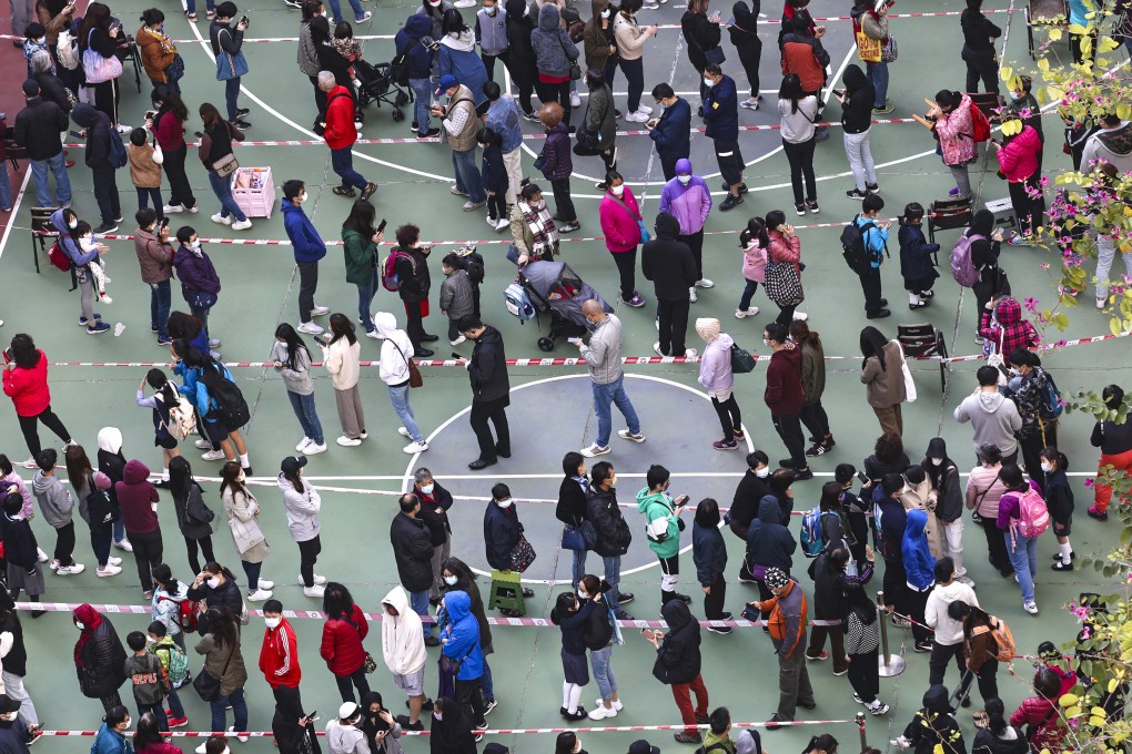 Residents queue up for Covid-19 testing at a community centre in Tuen Mun on Tuesday. The district has been identified as a high-risk area. Photo: K. Y. Cheng