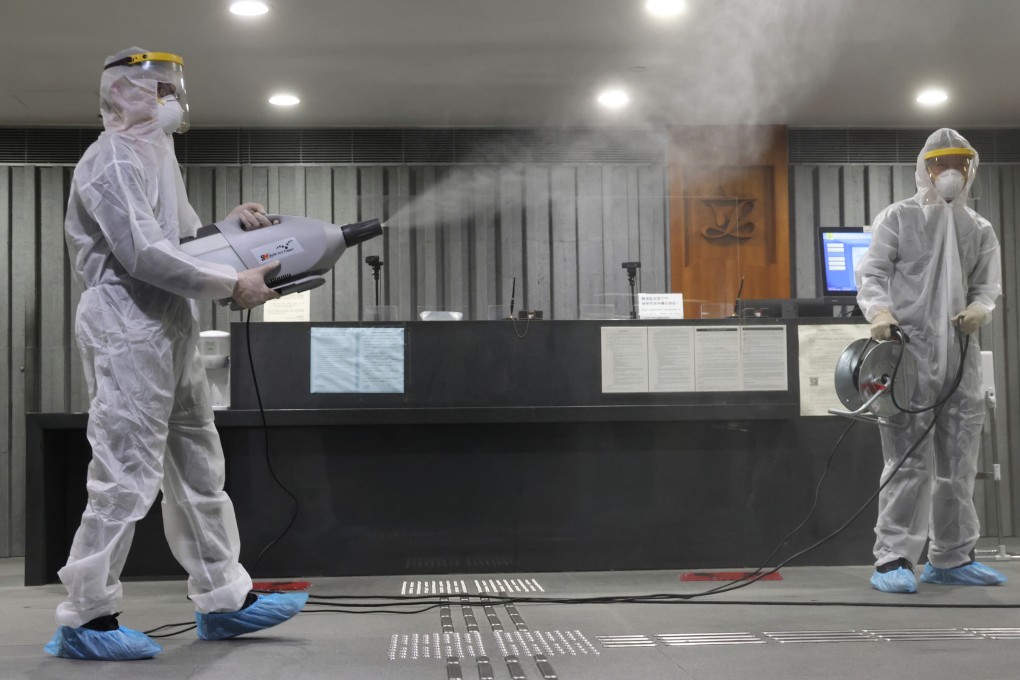 The reception area of the Legislative Council is disinfected on January 6 after it was found that several lawmakers attended a large birthday party and one of their fellow guests tested positive for Covid-19. Photo: May Tse