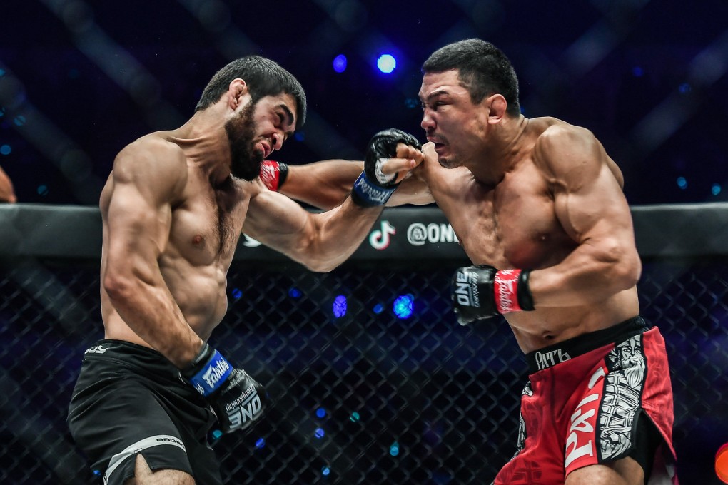 ‘Dagi’ Arslanaliev (left) and Timofey Nastyukhin exchange punches at ONE: Winter Warriors