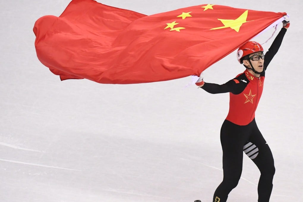 Wu Dajing celebrates victory after men’s 500m final of short track speed skating at the 2018 Pyeongchang Winter Olympic Games at Gangneung Ice Arena, South Korea. Photo: Xinhua
