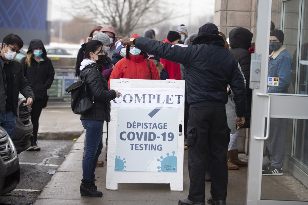 Residents wait in line outside a Covid-19 testing centre in Montreal, Quebec, in December. Photo: Bloomberg