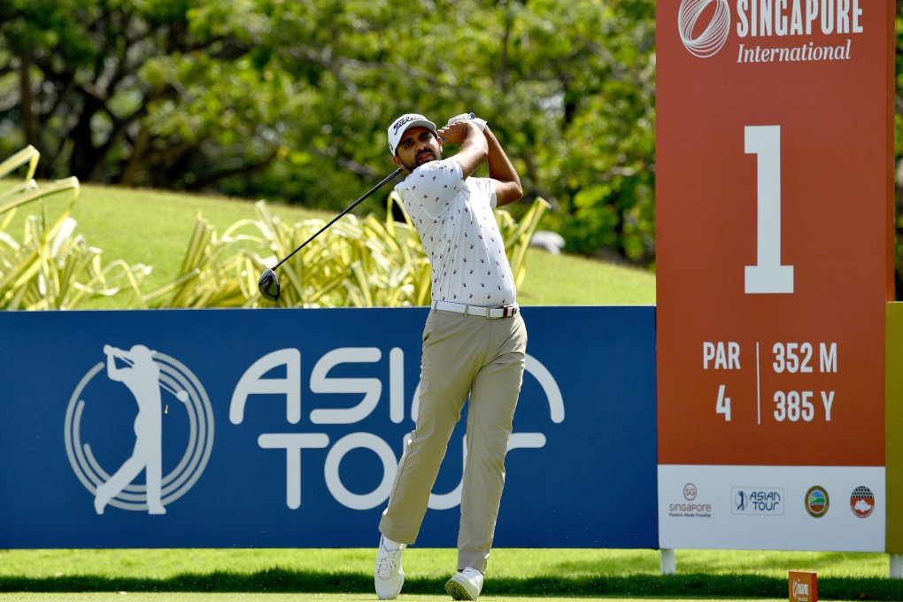Khalin Joshi tees off at the start of his first round at Tanah Merah Country Club. Photo: Asian Tour.