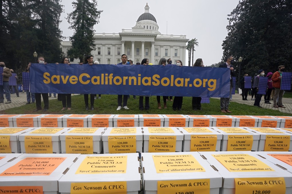 Boxes of petitions against proposed reforms that solar energy advocates claim would handicap the rooftop solar market are seen in front of the governor’s office during a rally at the Capitol in Sacramento, Calif., Wednesday, Dec. 8, 2021. Photo: AP