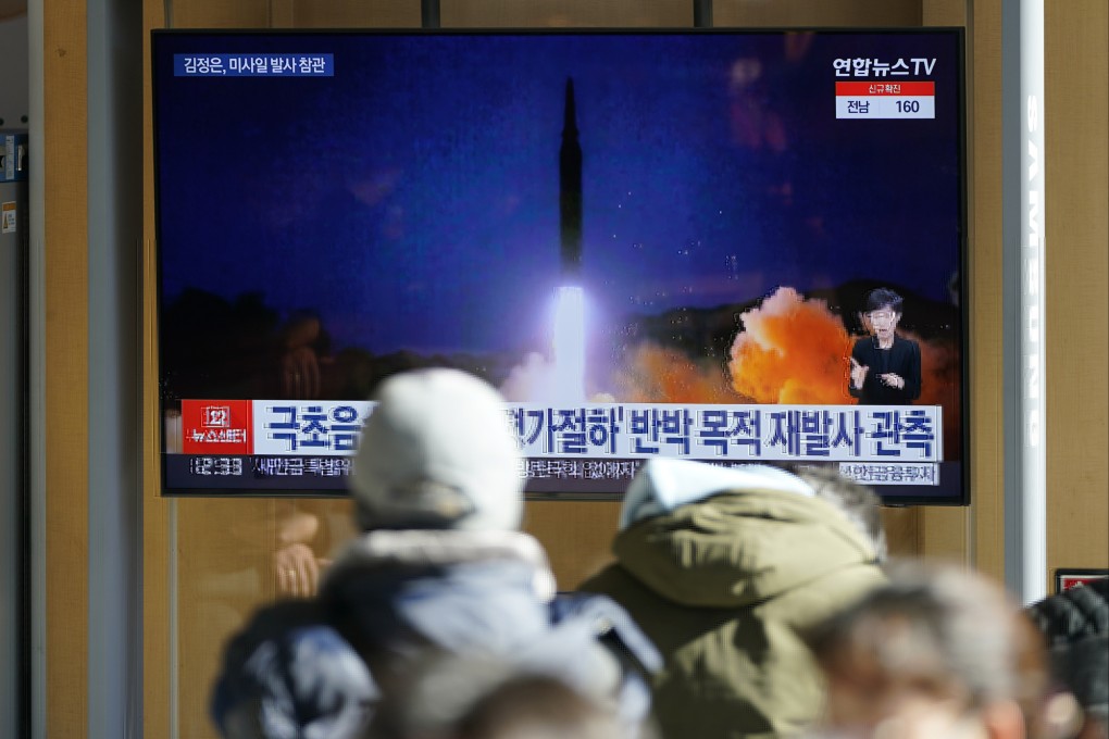 A broadcaster in Seoul narrates a report about North Korea’s hypersonic missile launch. Photo: AP
