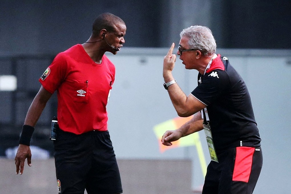 Tunisia coach Mondher Kebaier remonstrates with the referee Janny Sikazwe after Tunisia’s match with Mali at the Africa Cup of Nations. Photo: Reuters