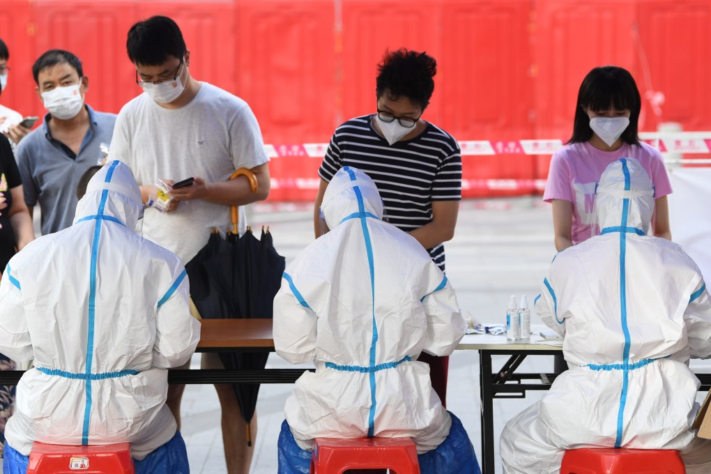 People line up for Covid-19 testing in Guangzhou, Guangdong Province. China’s health care sector was a hot spot for start-up funding in 2021. Photo: Xinhua