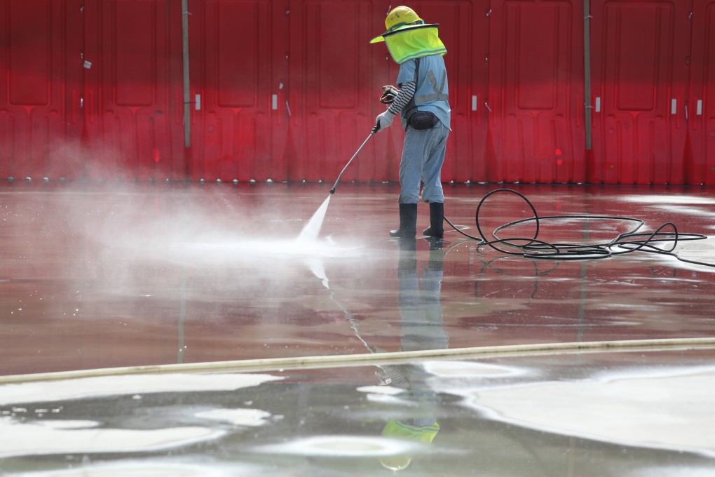 A street cleaner at work in Victoria Park on November 1, 2021. Some 16,500 workers in Hong Kong earn the minimum wage. Photo: Xiaomei Chen