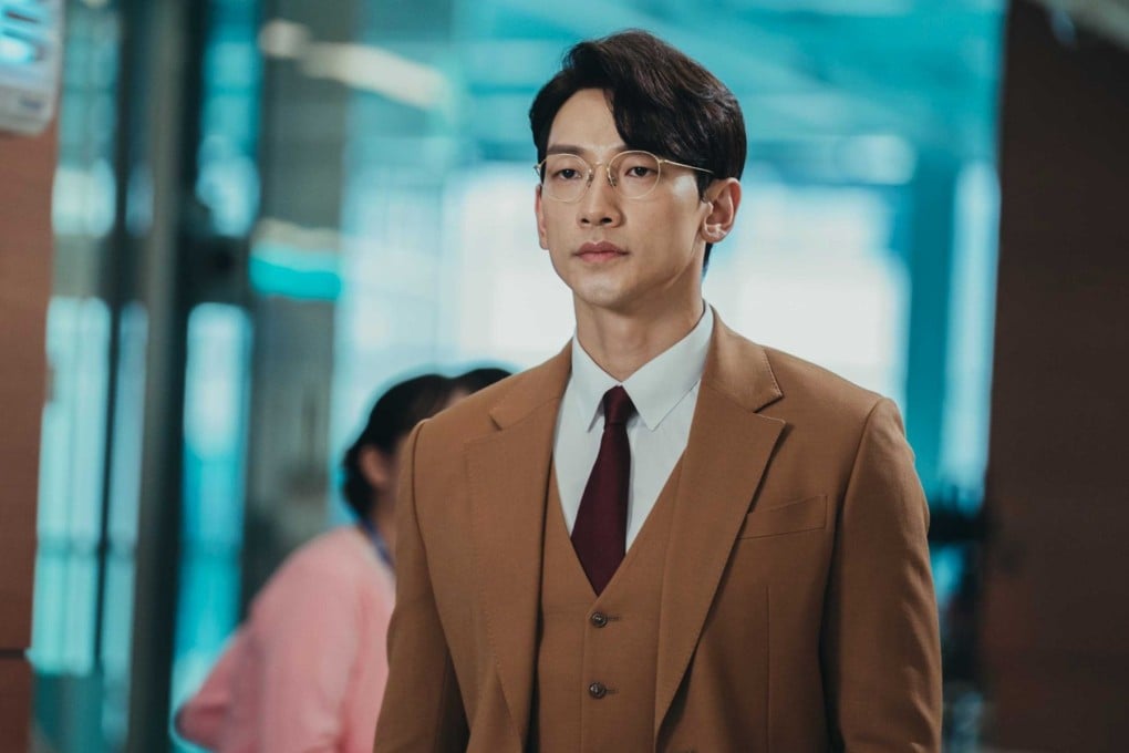 Rain in a still from Ghost Doctor, a new Korean drama series in which he plays an arrogant surgeon confronted with a cocksure heir apparent on whom his life will soon depend.