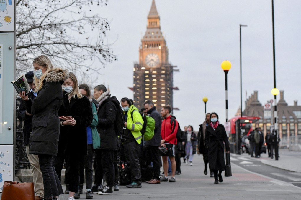 People queue for Covid-19 vaccines in London. Hong Kong students living in the UK have found themselves taken aback by the country’s comparatively lax approach to the pandemic. Photo: Reuters