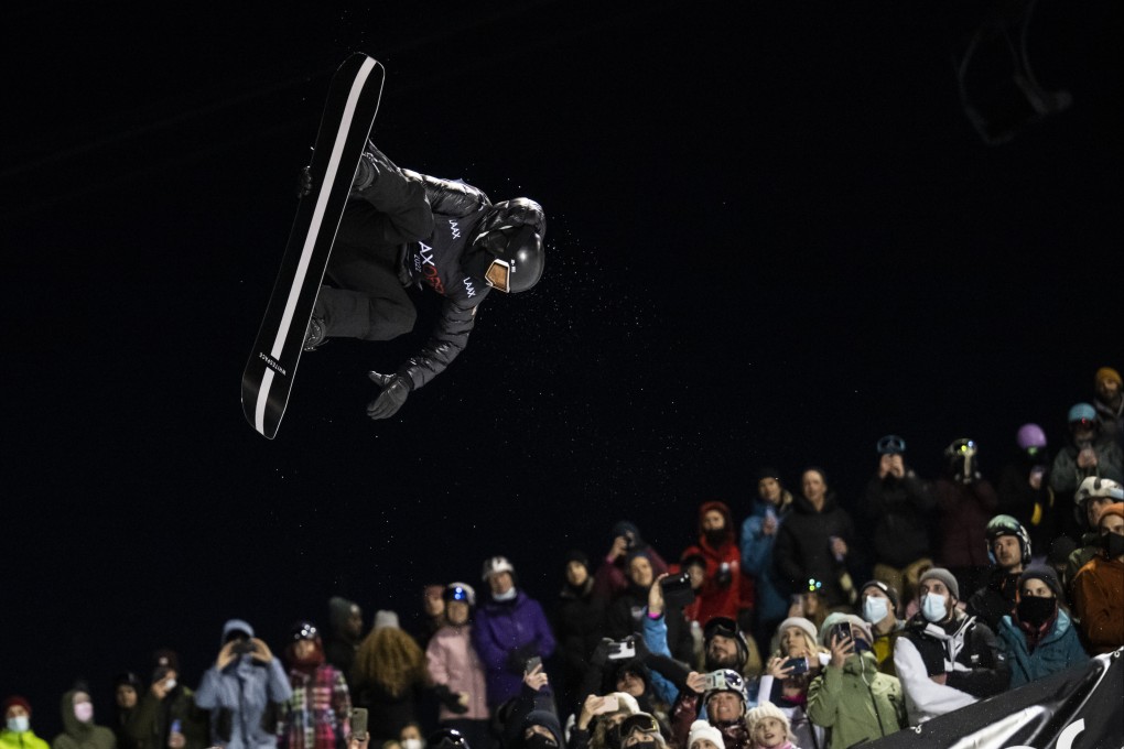 Shaun White flies in the air during the final run of the snowboard halfpipe competition at the Laax Open. Photo: AP