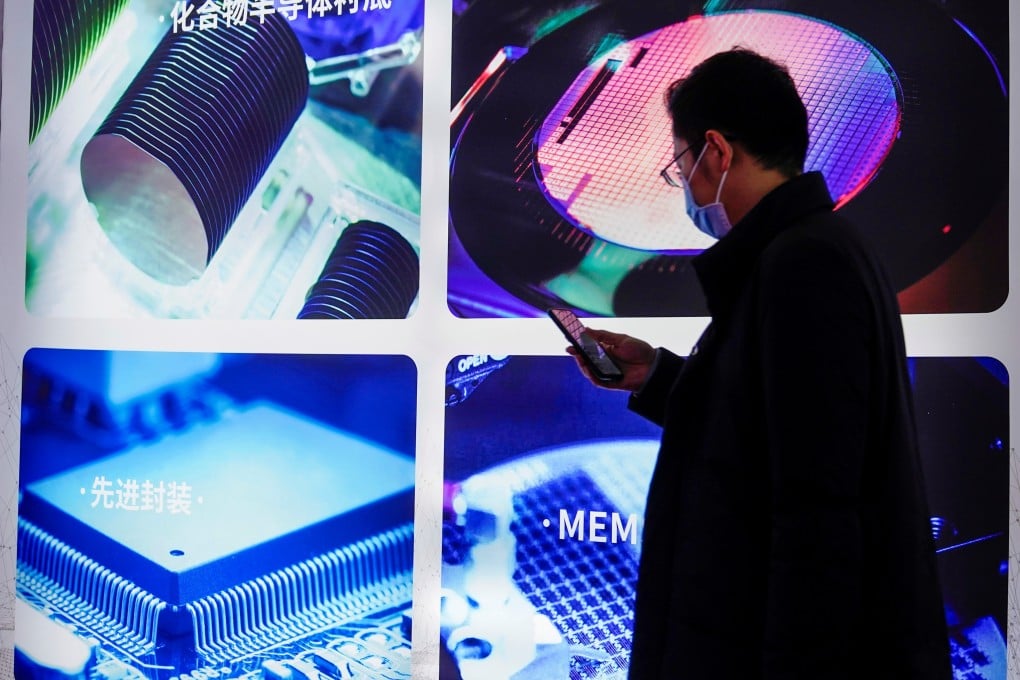A man views a display at the Semicon China exhibition, March 17, 2021. Photo: Reuters