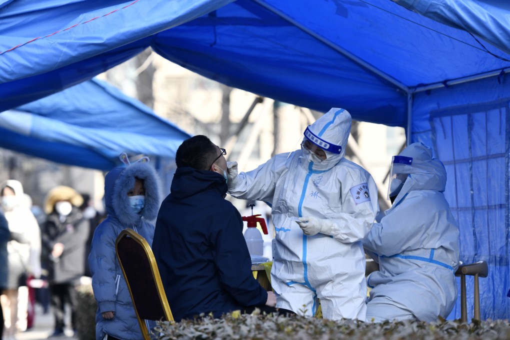 A resident gets tested in the northern city of Tianjin on Saturday. A third round of mass testing was completed over the weekend. Photo: Xinhua via AP