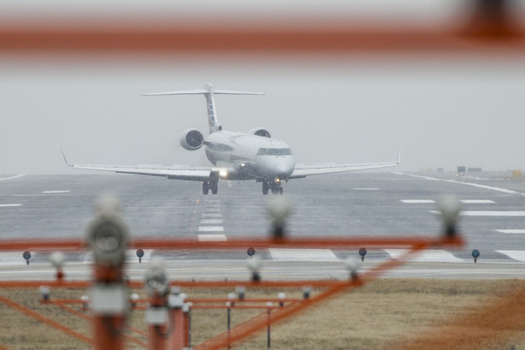 An American Airlines plane taxis at Ronald Reagan National Airport (DCA) in Arlington, Virginia, on Sunday. Photo: Bloomberg