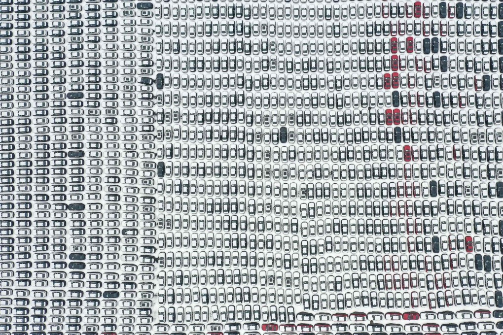 Aerial photo of newly-produced cars covered in snow at the factory of BMW-Brilliance in Shenyang in northeastern China’s Liaoning province on November 17, 2021. Photo: AFP