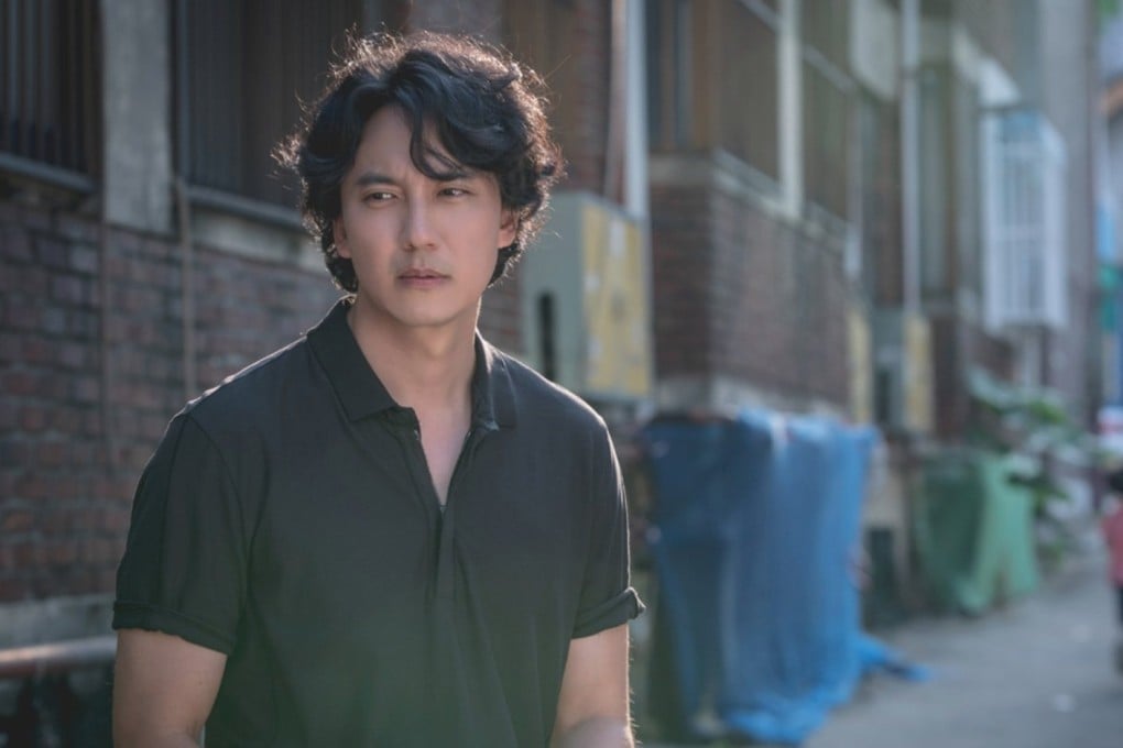 Kim Nam-gil in a scene from Through the Darkness. In the new 12-part K-drama from SBS, Kim plays an investigator with a traumatic past who uses criminal-profiling techniques to solve deadly crimes.