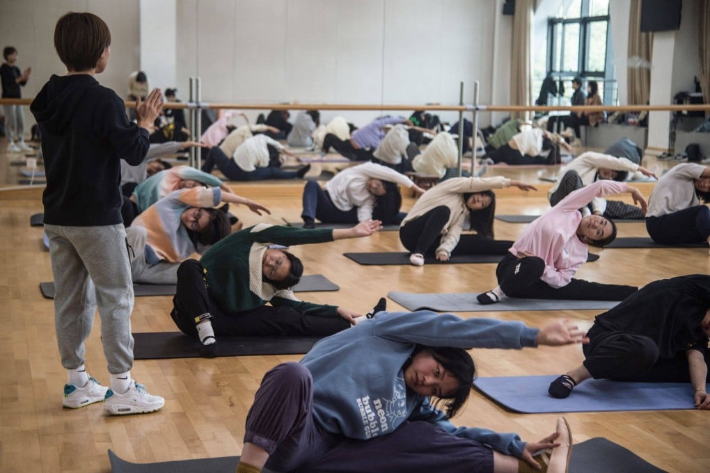 Former gymnast Sui Lu teaches a class in Shanghai as part of a youth fitness drive. Photo: AFP