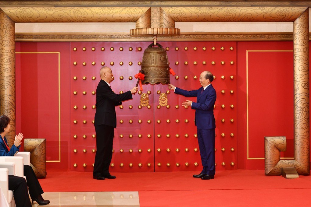 Beijing Communist Party chief Cai Qi (left) and
Yi Huiman, chairman of the China Securities Regulatory Commission, attend the opening ceremony of the Beijing Stock Exchange on November 15, 2021. Photo: Xinhua