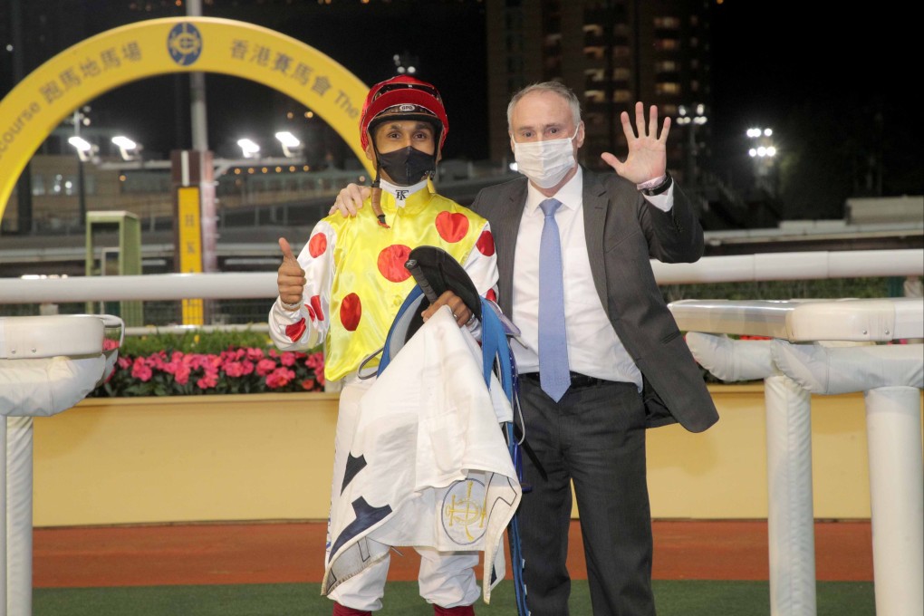 Karis Teetan (left) and Paul O’Sullivan celebrate their 500th career winners at Happy Valley. Photo: HKJC