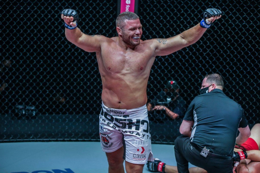 Anatoly Malykhin celebrateshis win over Alexandre Machado. Photos: ONE Championship