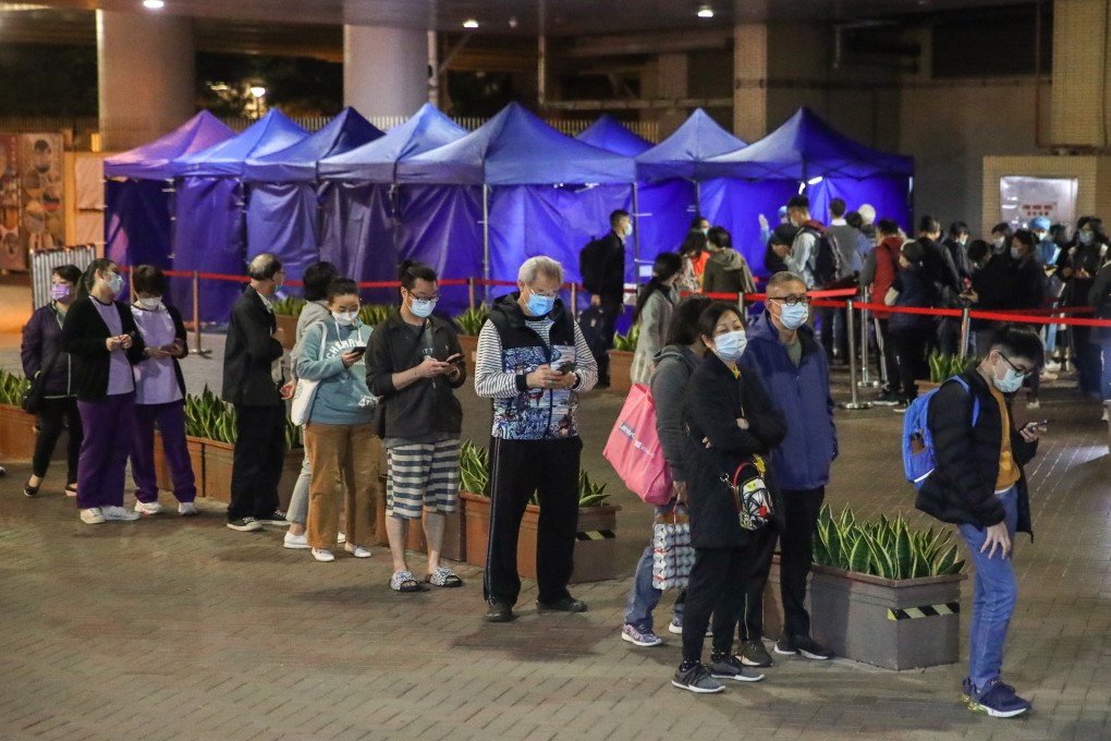 Residents wait to get screened at a mobile testing station in Mei Foo. Photo: Edmond So