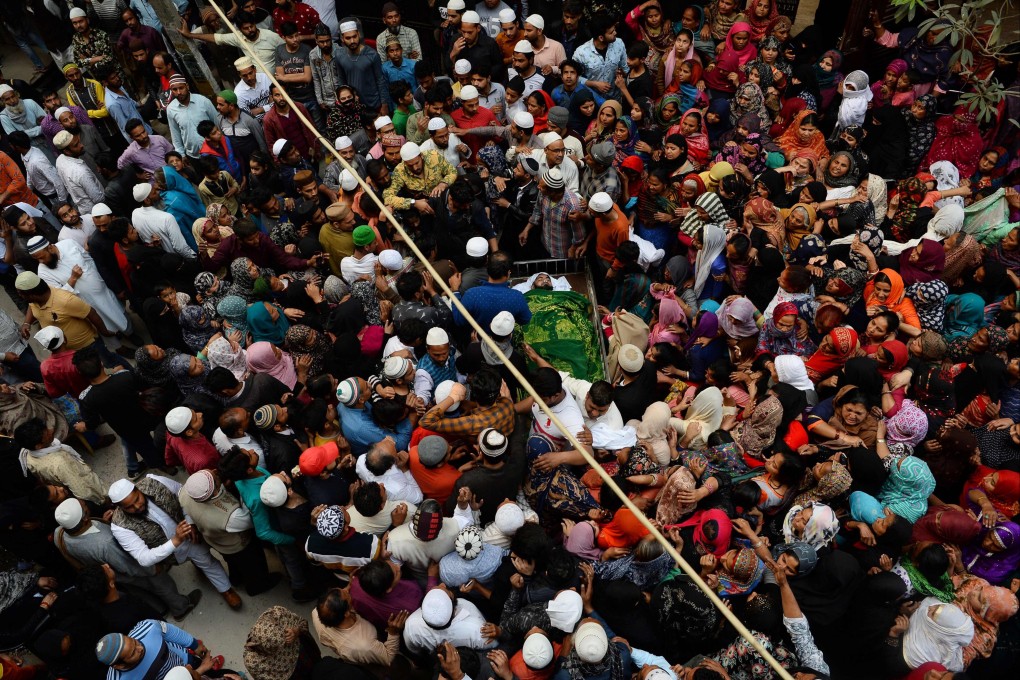 Funeral for a man who died in the New Delhi riots in 2020. Photo: AFP