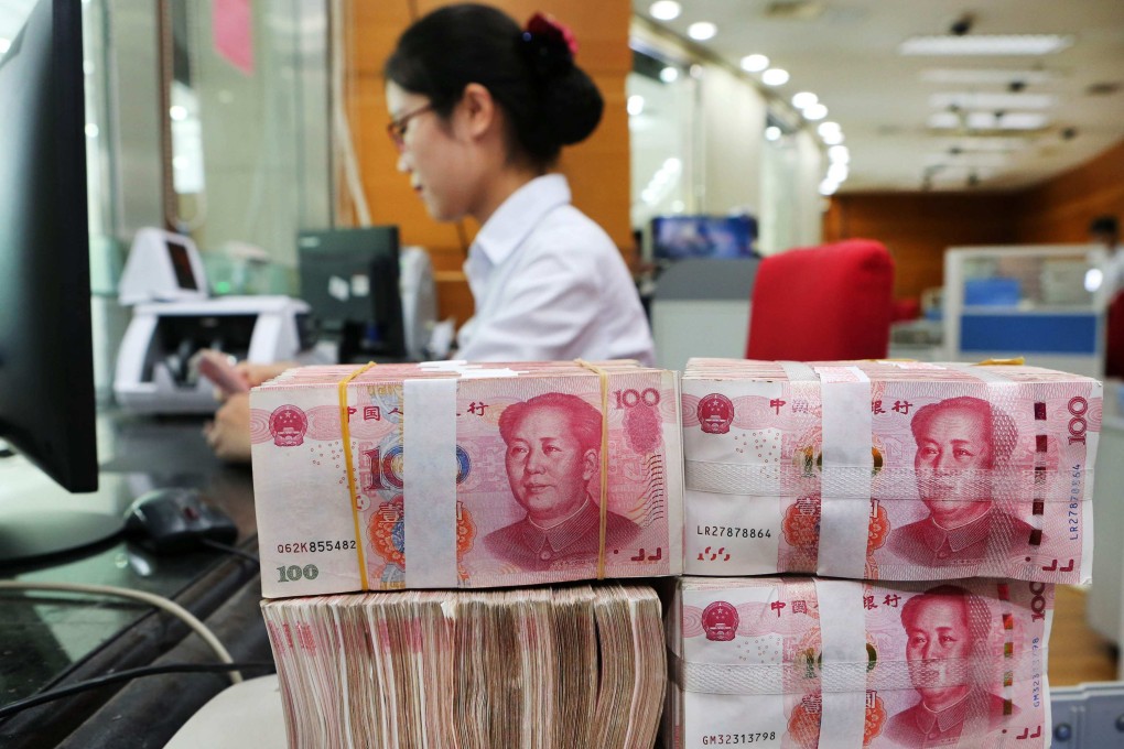 China’s one-year loan prime rate (LPR) was cut from 3.80 per cent to 3.7 per cent, the People’s Bank of China said on Thursday, while the reference rate for mortgages was also cut. Photo: AFP