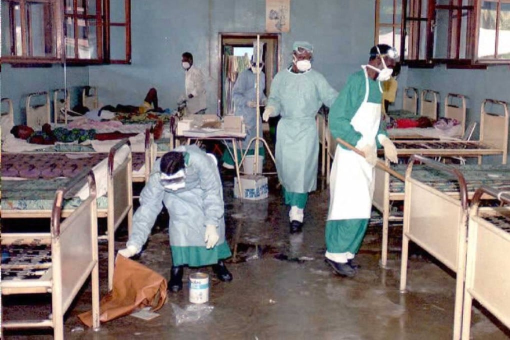 Hospital orderlies in the Democratic Republic of Congo, West Africa, clean a ward occupied by patients affected by the Ebola virus. Diseases such as Ebola can cause widespread death. Photo: AFP