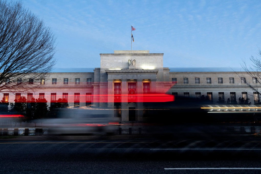 Vehicles drive past the US Federal Reserve in Washington, DC, on January 10. An excessive tightening in monetary policy was cited by respondents of a fund managers’ survey as the biggest risk facing financial markets. Photo: AFP