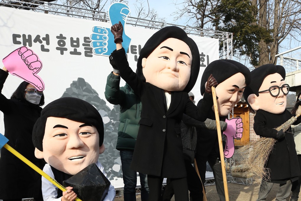 Environmental activists wearing masks of South Korea’s four major presidential candidates. Photo: EPA