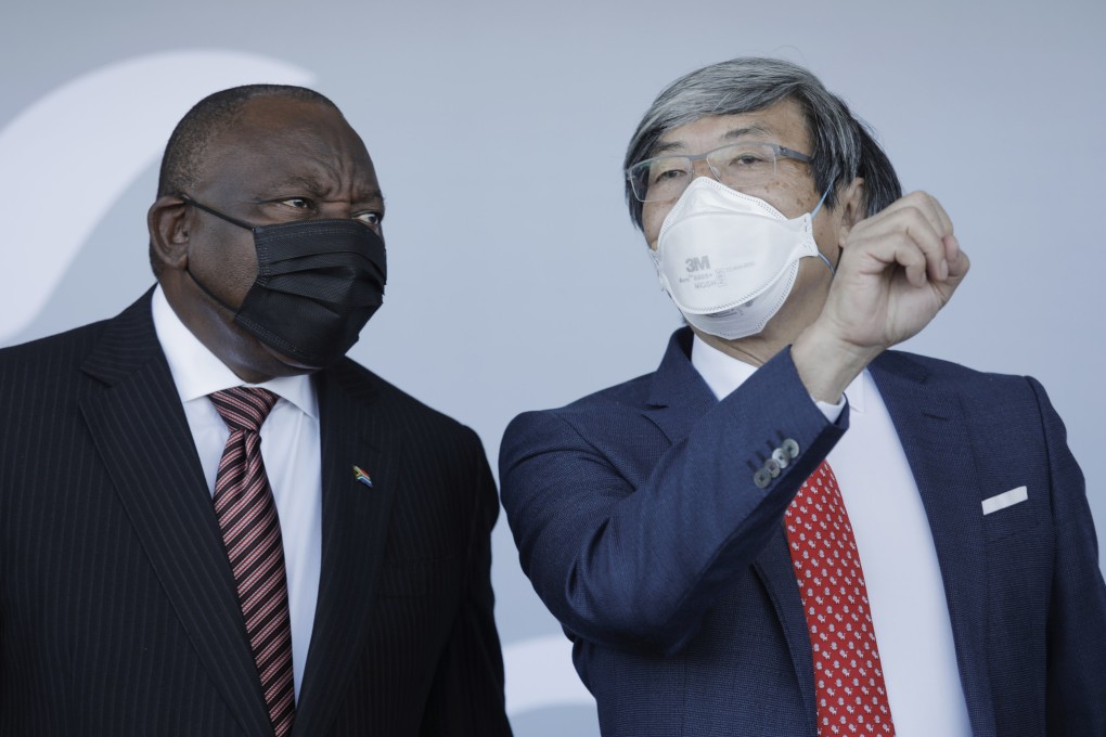 South African President Cyril Ramaphosa (left) and NantWorks founder Patrick Soon-Shiong chat during the inauguration of the NantSA vaccine production facility in Cape Town on Wednesday. Photo: EPA-EFE