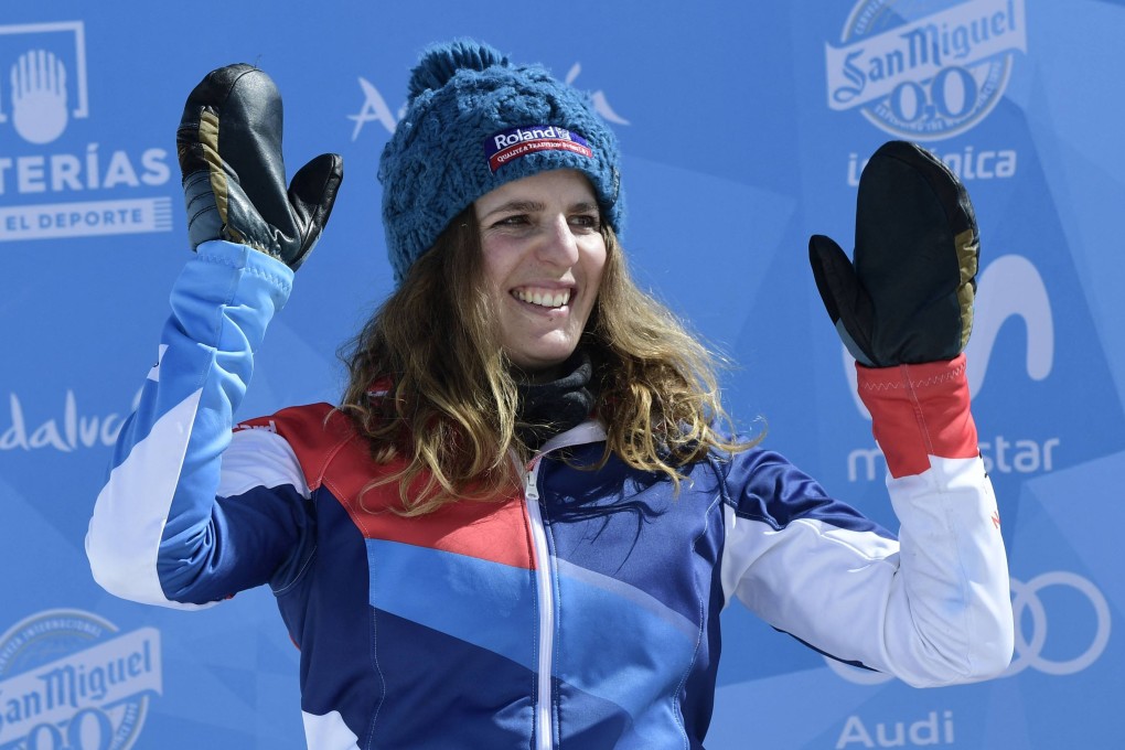 Silver medallist Patrizia Kummer celebrates on the podium after the women’s Parallel Giant Slalom PGS final at the 2017 FIS Snowboard and Freestyle Ski World Championships in Sierra Nevada. Photo: AFP