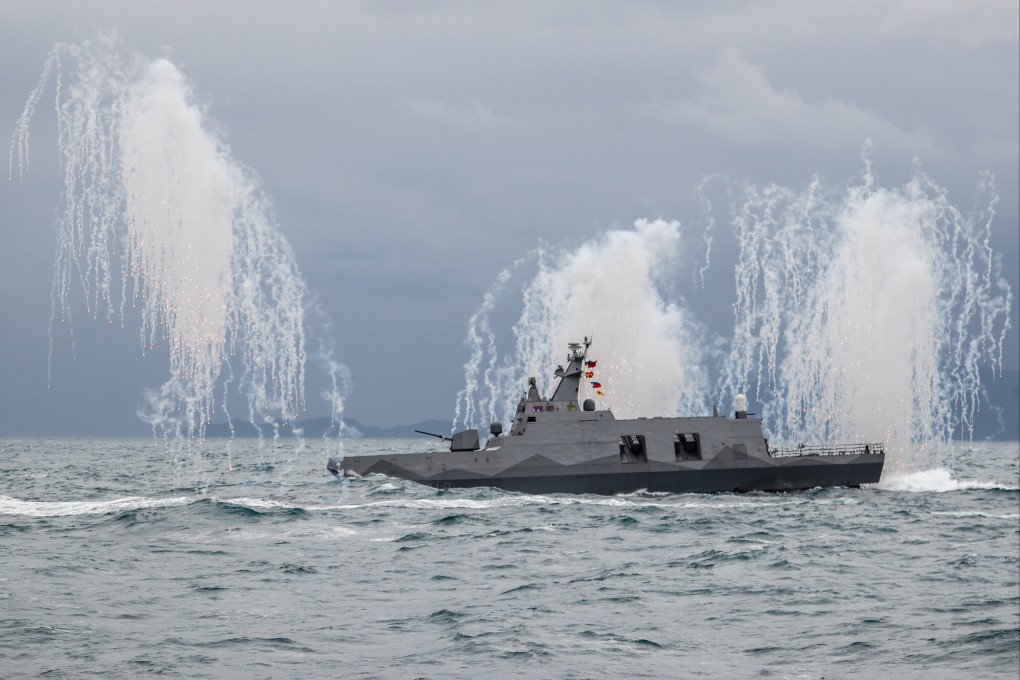 A Taiwanese corvette fires flares during a navy drill earlier this month. The island lives with the threat of invasion by Beijing. Photo: dpa