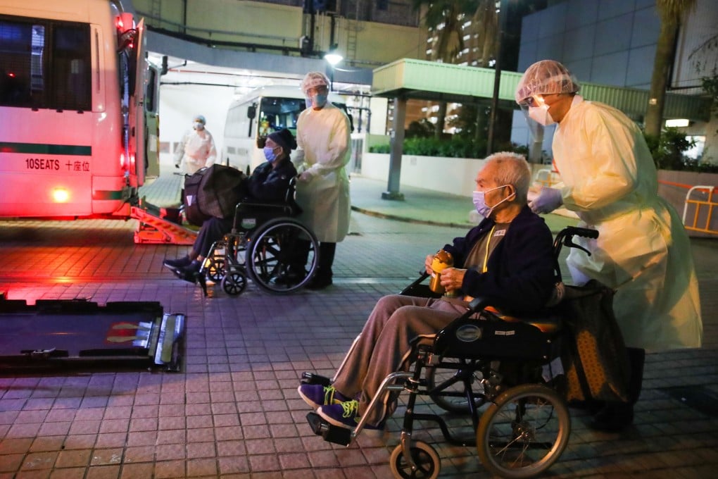 Elderly residents are moved out of a nursing home at Kwai Chung Estate on Saturday. Photo Edmond So