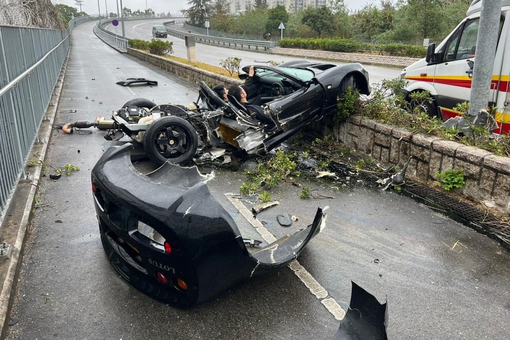 The driver and passenger inside the Lotus after the crash on Pok Yin Road in Tai Po. Photo: Handout