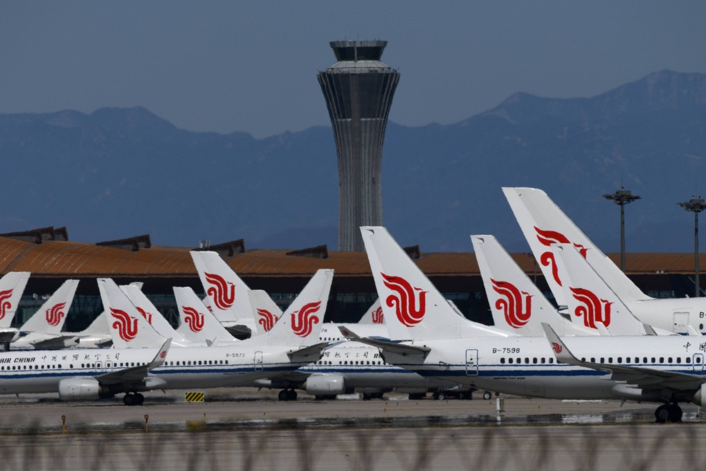 Air China planes are seen parked on the tarmac at Beijing Capital Airport in March 2020. Photo: AFP