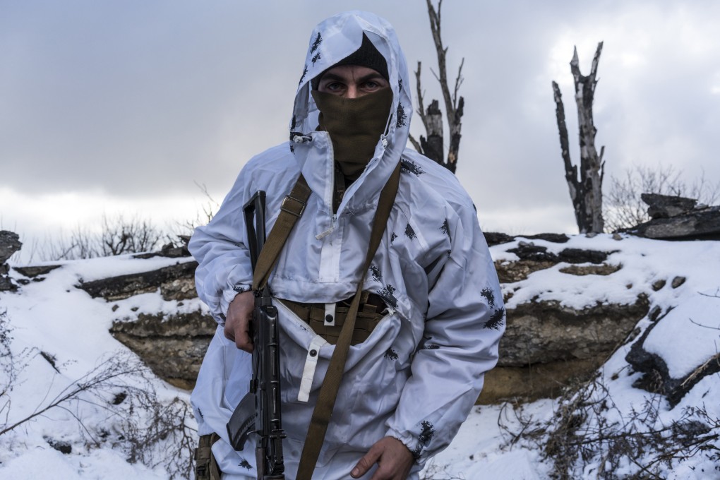 A Ukrainian soldier in a trench on  in Pisky, Ukraine on January 22. Photo: Getty Images / TNS
