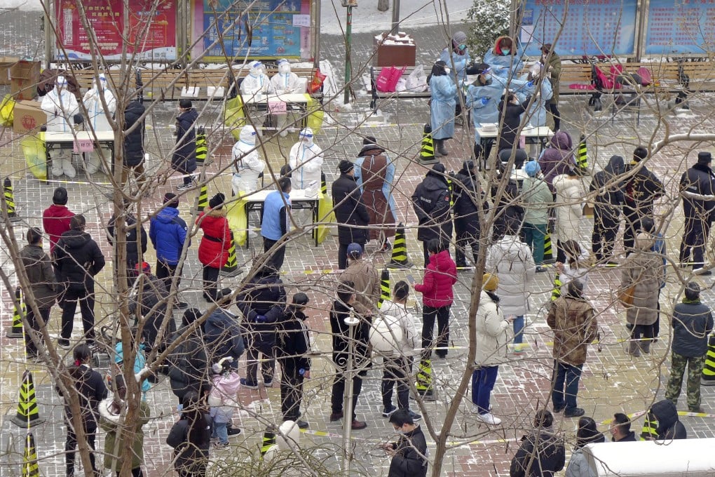 People wait to take a Covid-19 test in Beijing on Sunday. Photo: Kyodo