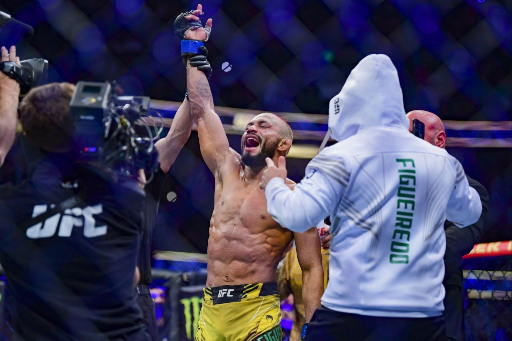 Deiveson Figueiredo celebrates his win over Brandon Moreno at UFC 270. Photo: Gary A. Vasquez-USA TODAY Sports