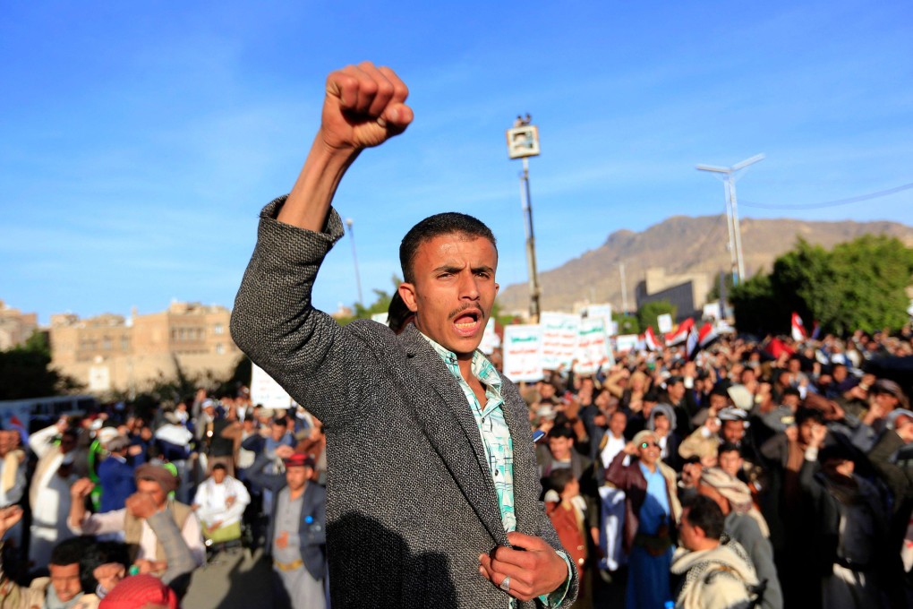 Houthi supporters protest in the Yemeni capital Sanaa following a reported air attack by the Saudi-led coalition on a prison in the country’s rebel-held north, on January 21. Photo: AFP