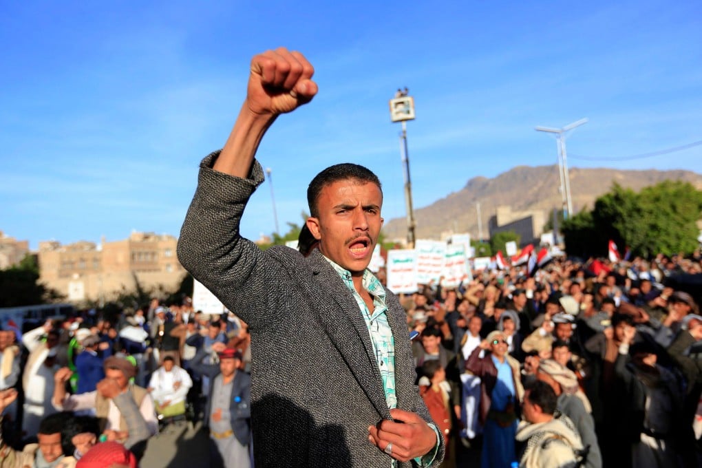 Houthi supporters protest in the Yemeni capital Sanaa following a reported air attack by the Saudi-led coalition on a prison in the country’s rebel-held north, on January 21. Photo: AFP