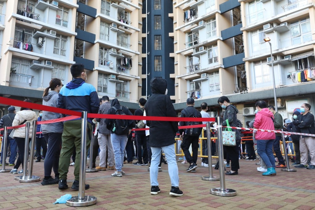 Residents line up to get tested for Covid-19 at a mobile specimen collection station in Kwai Chung Estate. Photo: Yik Yeung-man