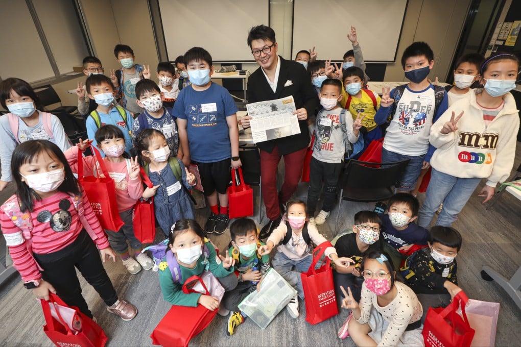 Hong Kong magician and mentalist Zenneth Kok with the children who attended his workshop on November 27. Photo: Xiaomei Chen