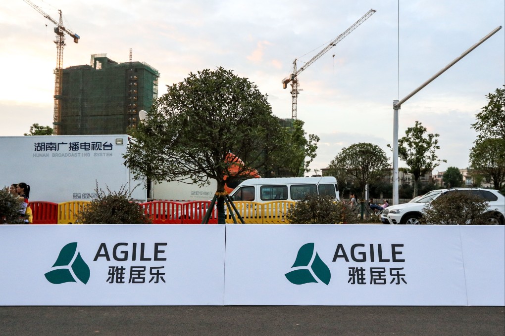 Agile said it will sell its 26.7 per cent stake in a Guangzhou property joint venture for 1.84 billion yuan (US$300 million) to a unit of China Overseas Land & Investment (Coli). Photo: Imaginechina via AFP