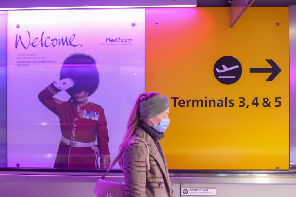 A passenger moves between terminals at Heathrow Airport in London on January 7. Photo: Xinhua