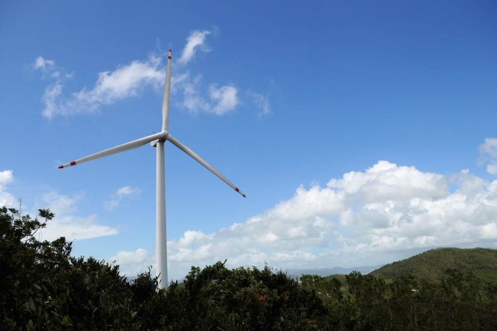 A wind turbine on Lamma Island, Hong Kong. Government initiatives can make it easier for businesses to reduce their dependence on carbon-intensive goods and services. Photo: Shutterstock