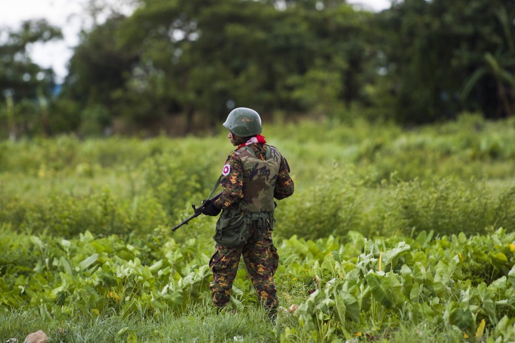 A Myanmar soldier stands guard near an airfield in Rakhine state in 2018. Photo: AFP